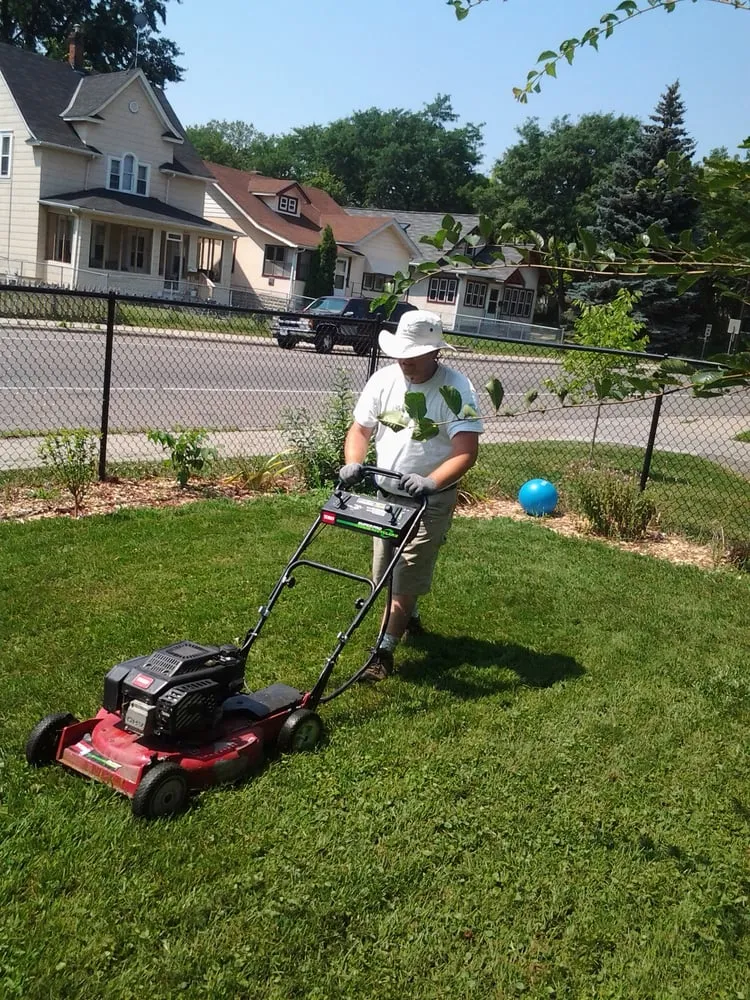Affordable lawn mowing service for beautiful yards in Minneapolis, MN by Fj Lawn Care
