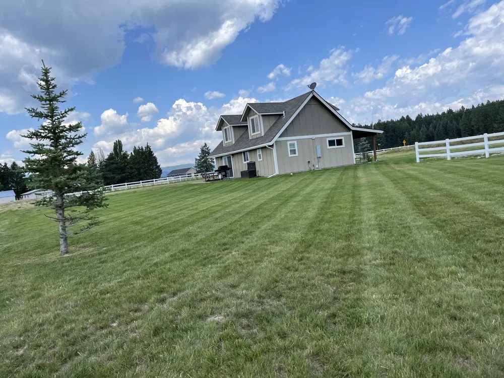 Custom yard cleanup service with custom design across Kalispell, MT - Flathead Cut