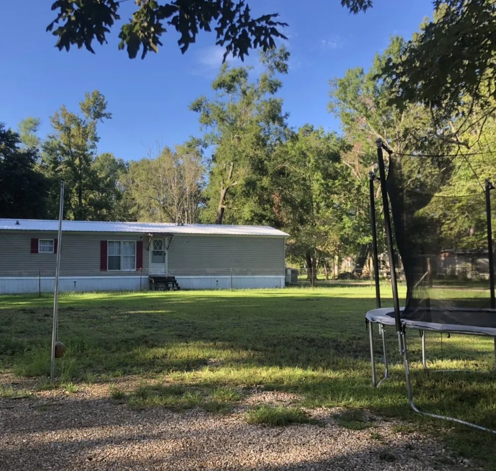 Reliable lawn mowing service for beautiful yards across Denham Springs, LA - Flawless Landscaping