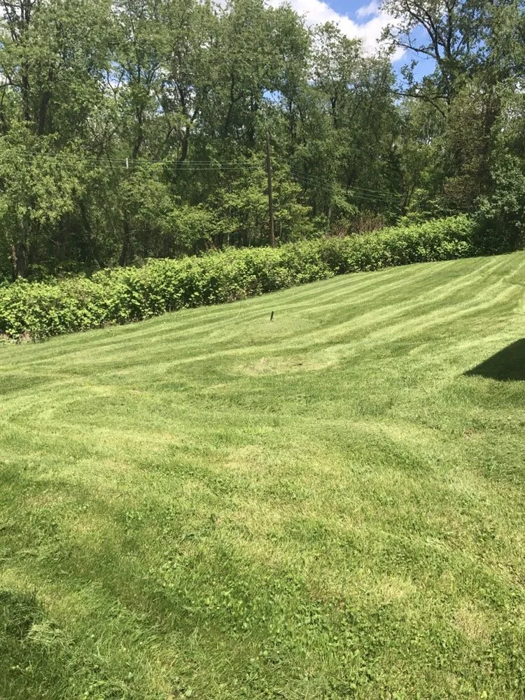 Expert lawn mowing service for year-round maintenance in North Versailles, PA by Flawless Landscaping