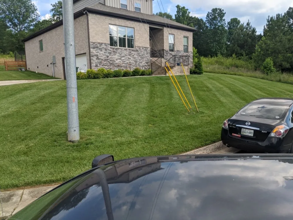 Affordable lawn mowing service with custom design in McEwen, TN by Flemings Detailed Lawn Care