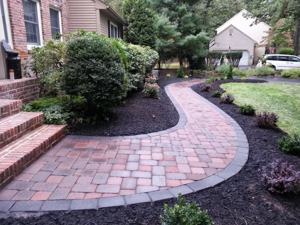 Custom lawn mowing service in Mount Laurel, NJ by Fleur De Lis Hardscaping