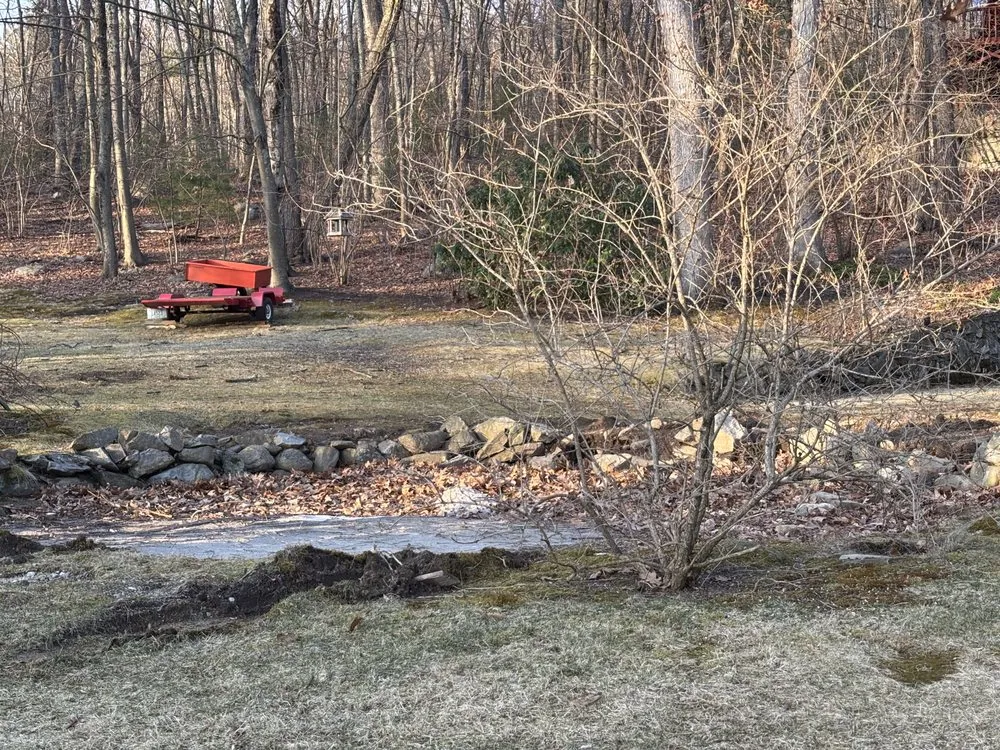Custom yard cleanup service for beautiful yards in Cumberland, RI by Fleury Dirt Works & Services