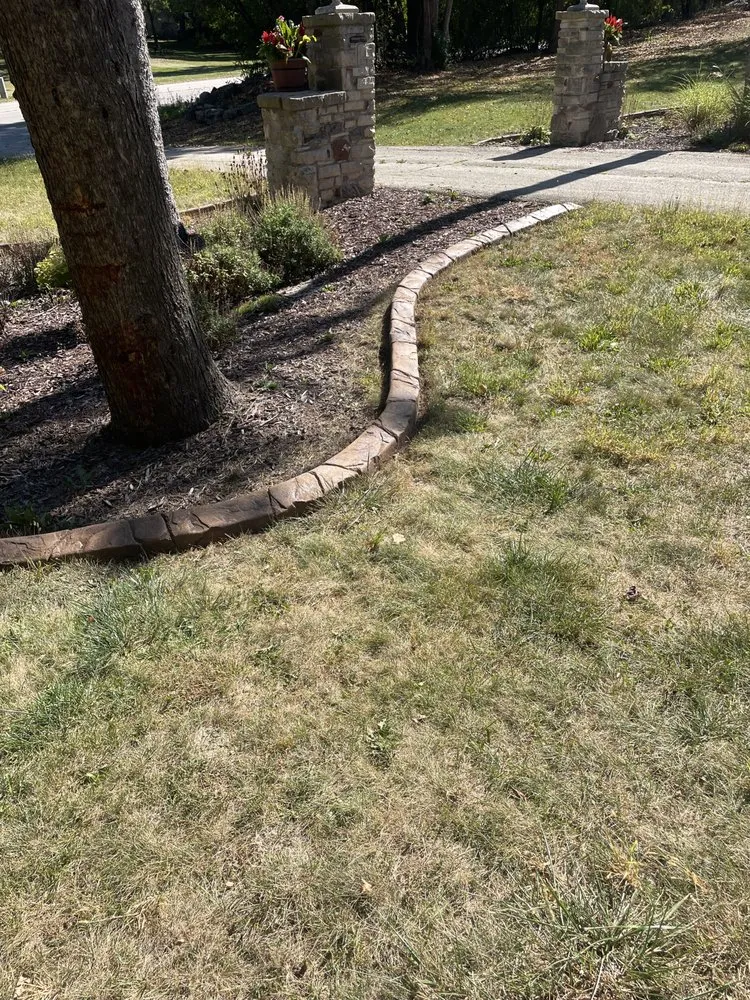 Custom residential landscaping for beautiful yards in Fond du Lac, WI by Flex Landscape Curbing