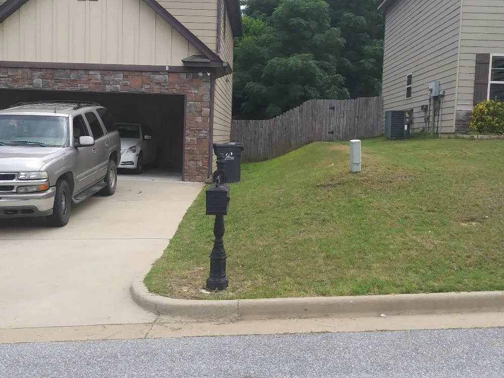 Local lawn mowing service for residential properties in Phenix City, AL by FLO Landscaping