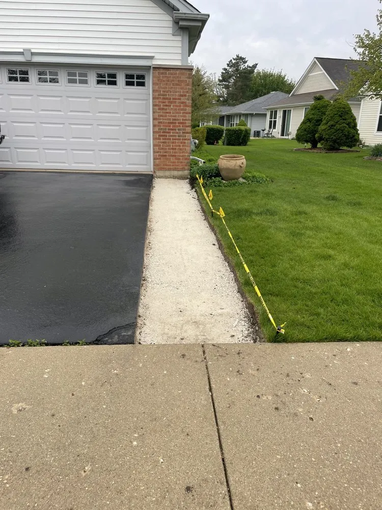 Custom garden landscaping for residential properties across Harvard, IL - Florencio Lawn & Farm Services