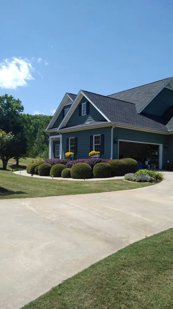 Professional lawn care service in Mount Airy, GA by Flores Family