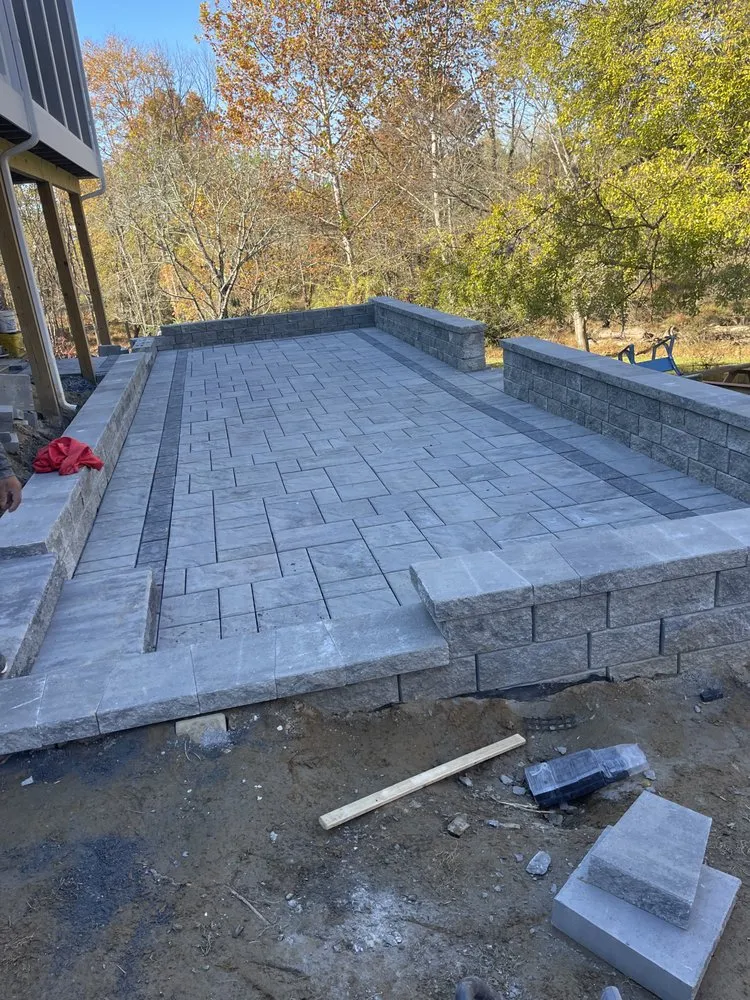 Custom landscape installation for residential properties in Annapolis, MD by Flores Green Care