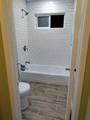 Flores Landscape and Construction Logo