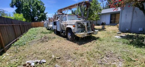 Flores Landscape Maintenance Logo
