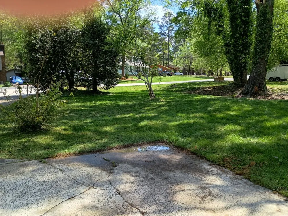 Reliable lawn mowing service for homes in Durham, NC by Flores Landscaping & Tree Service