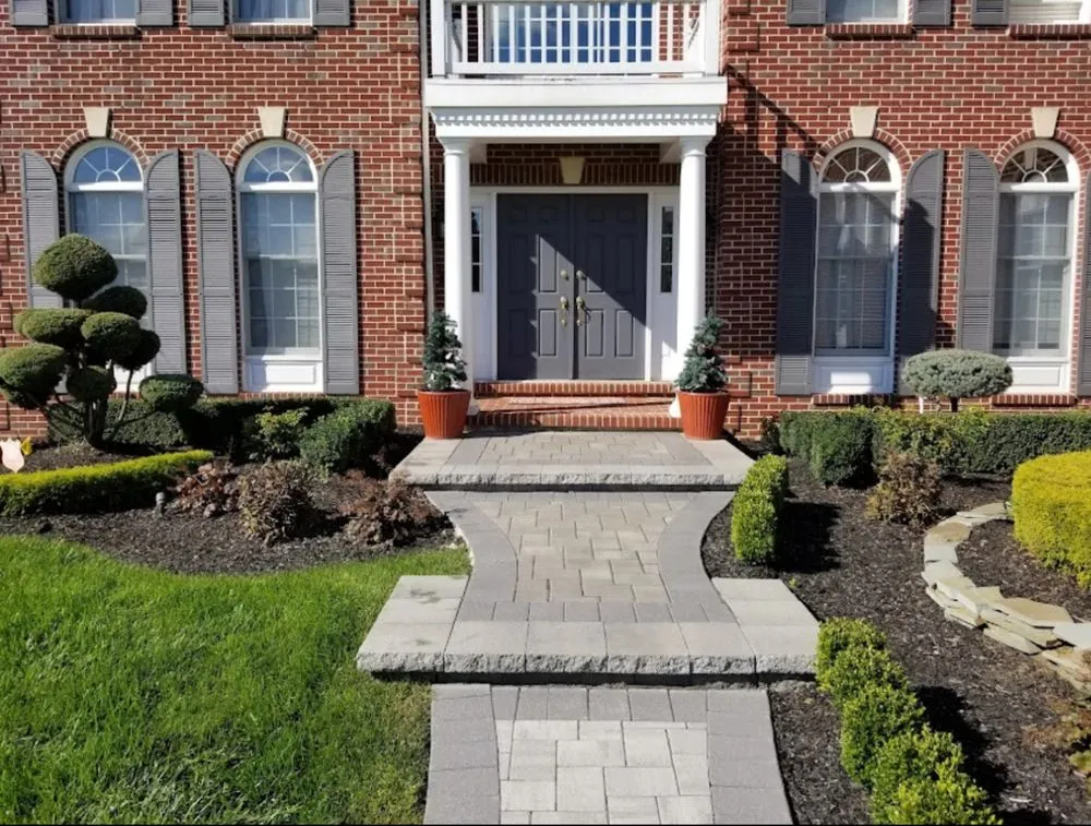 Custom yard maintenance for homes in Jackson Township, NJ by Flores Lawn Care and Landscaping