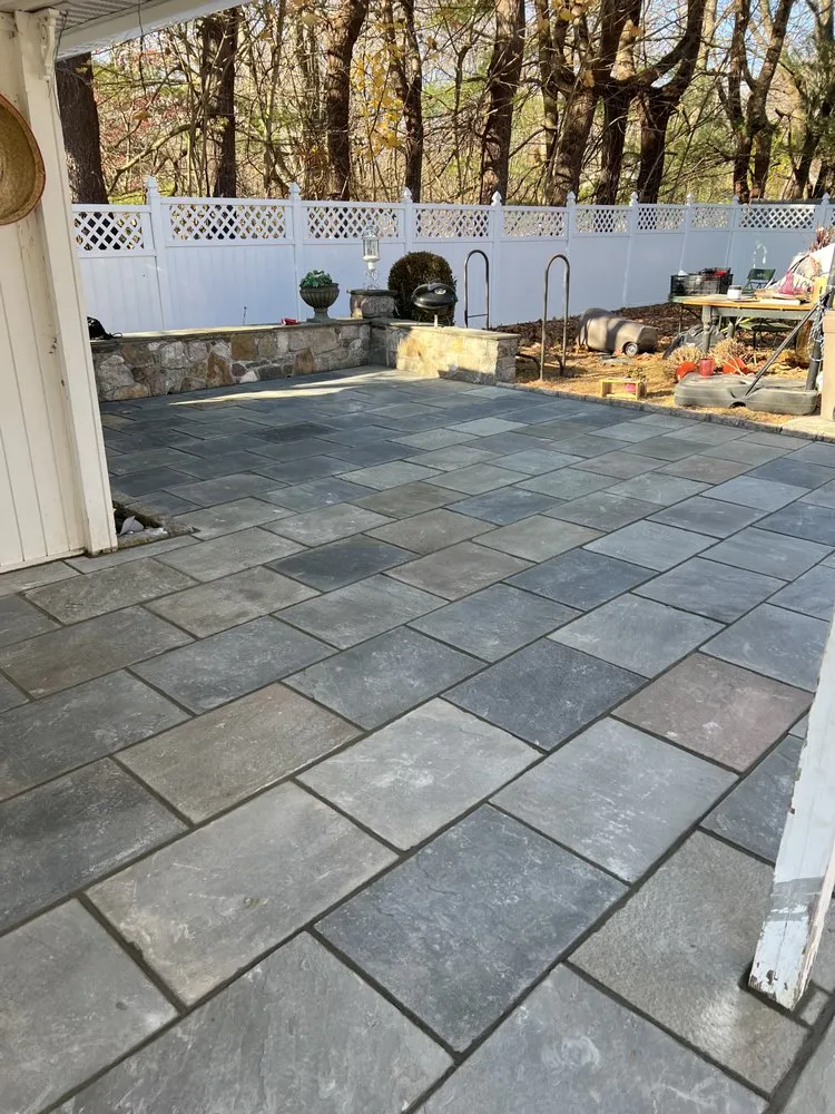 Expert lawn care service for residential properties in Peekskill, NY by Flores Masonry And Landscaping