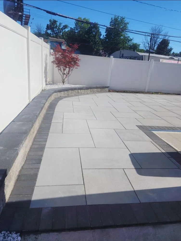 Affordable landscape design for homes in Irvington, NJ by Flores Quality Landscaping