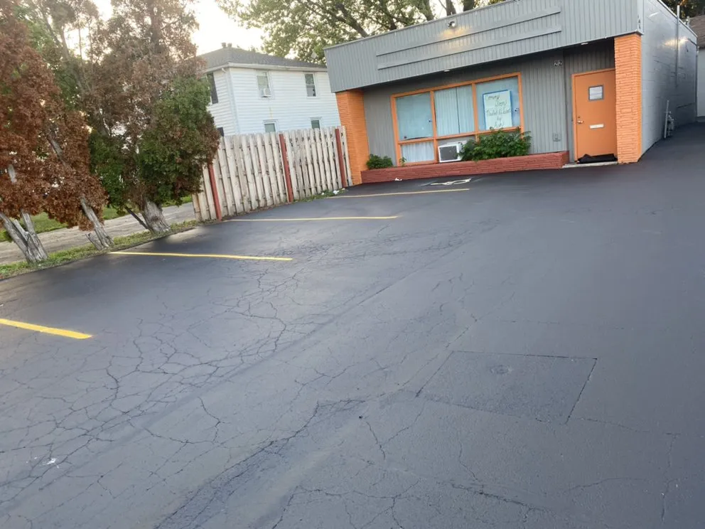 Affordable lawn care service with custom design in Hilton, NY by Flores Sealcoating