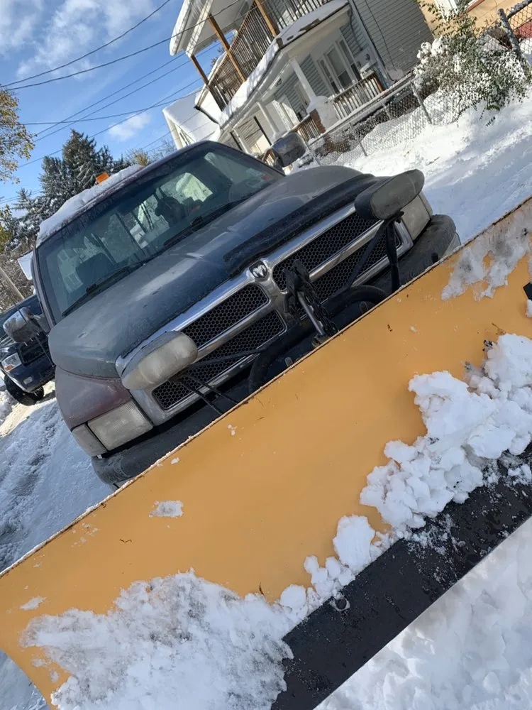 Custom lawn care service in Hilton, NY by Flores Sealcoating