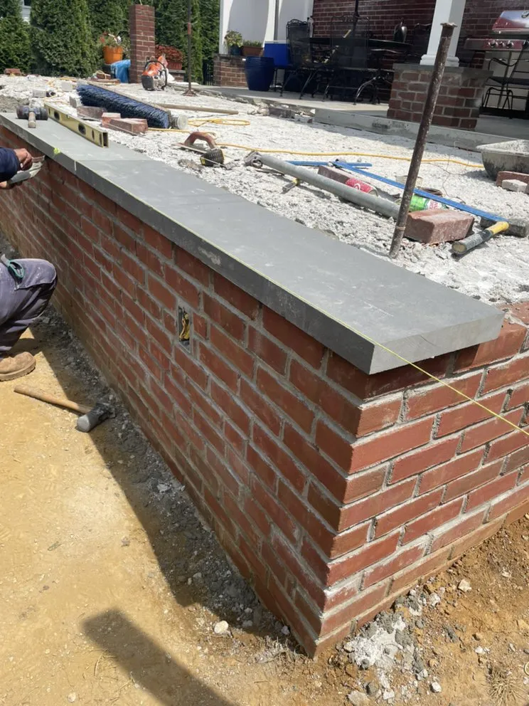 Custom landscape installation in Norristown, PA by Floresbrothers