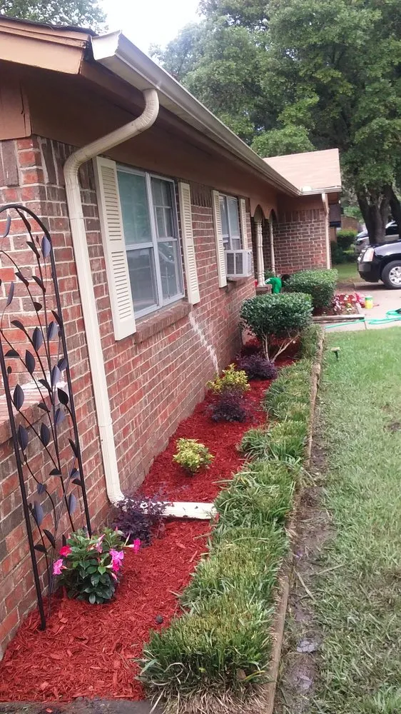 Custom outdoor landscaping for homes in Grapevine, TX by Flowerbeds Landscaping Clean Trim Mulch