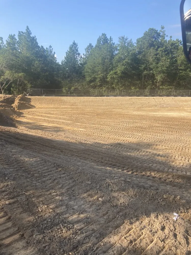 Reliable lawn care service in Pensacola, FL by Flowers And Land Clearing