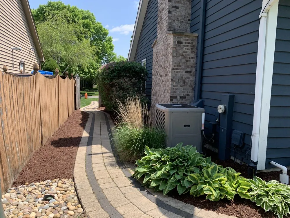 Professional landscaping services for residential properties in Aurora, IL by Flowers Landscaping