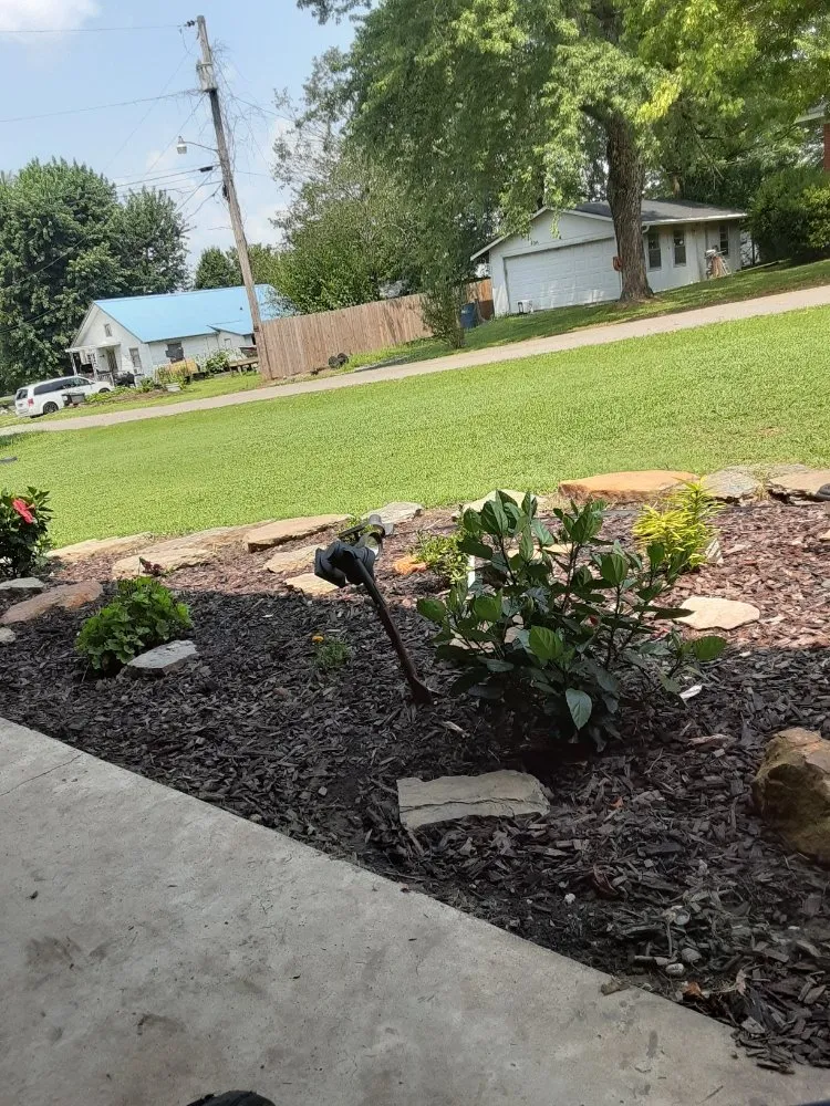 Local lawn mowing service for year-round maintenance across Marshall, AR - Flud's Landscaping