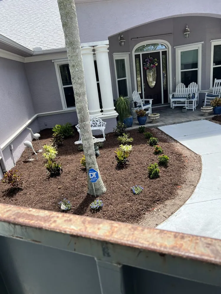 Local garden landscaping with custom design in Palm Bay, FL by Fluorescent Lawn Care
