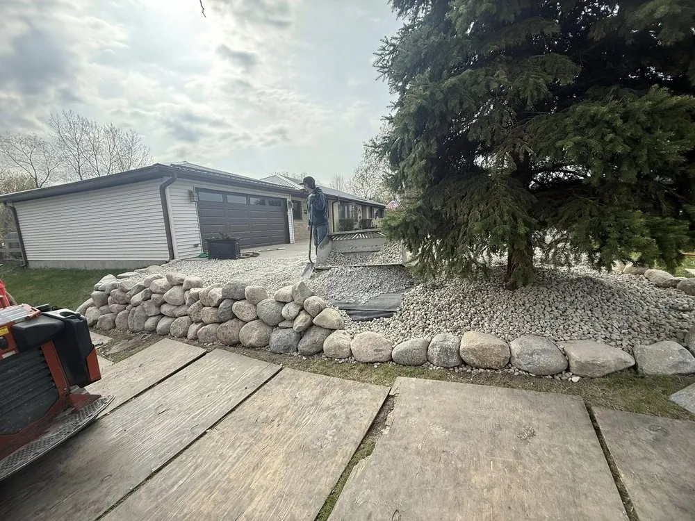 Local yard cleanup service with custom design in Salem, WI by FNS Tree And Landscaping