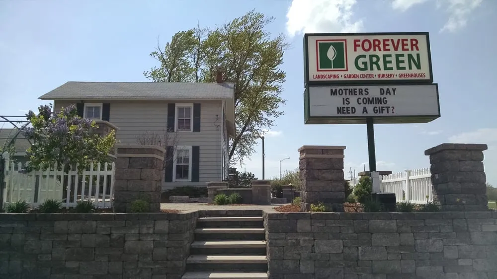 Custom yard maintenance in Coralville, IA by Forever Green