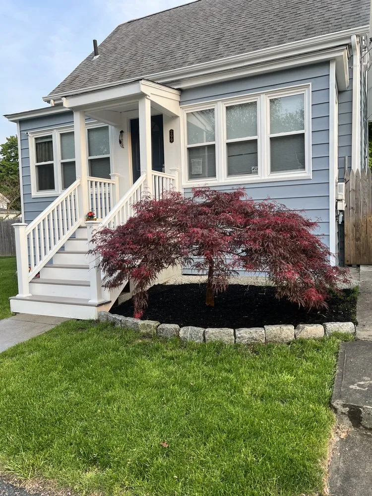 Custom landscape design for year-round maintenance in Fall River, MA by Forever Green