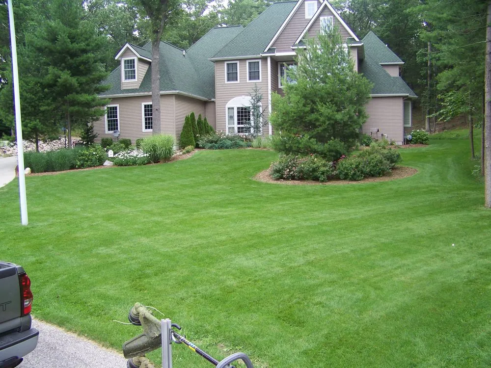 Custom landscape design for beautiful yards in Muskegon, MI by Forever Lawn Services