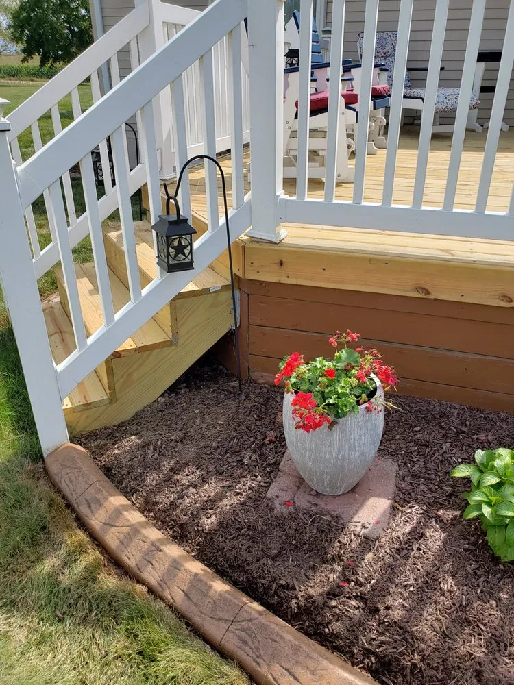 Professional yard maintenance for year-round maintenance in Fort Wayne, IN by Fort Wayne Decorative Curbing - FWDC