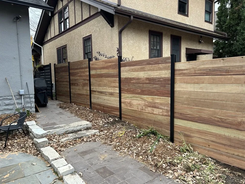 Affordable landscape design with custom design in Coon Rapids, MN by Foss Fence & Landscaping