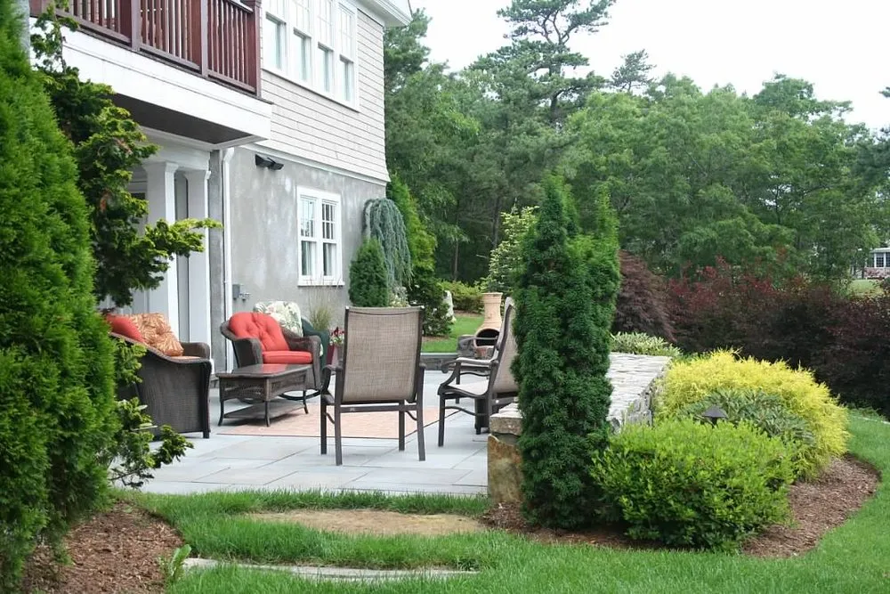 Affordable lawn mowing service for year-round maintenance in Sagamore Beach, MA by Foster Creative Designs
