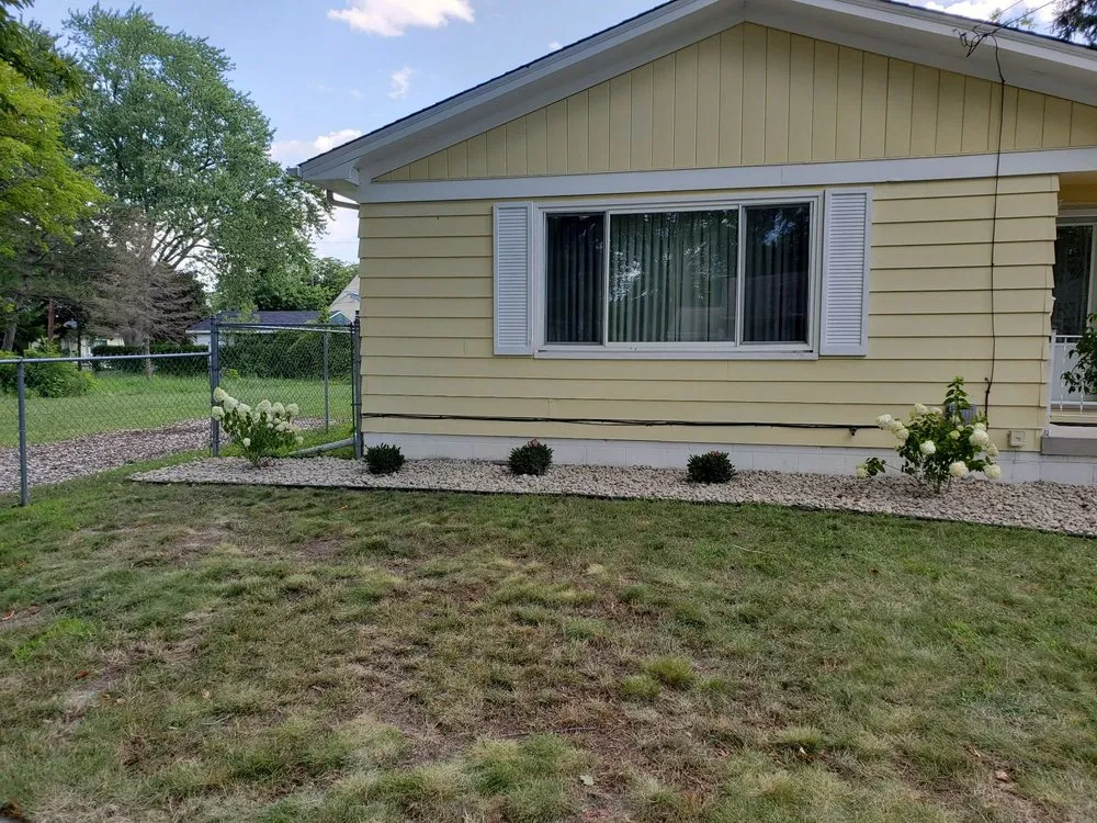 Local yard maintenance for year-round maintenance across Saginaw, MI - Fosters Development