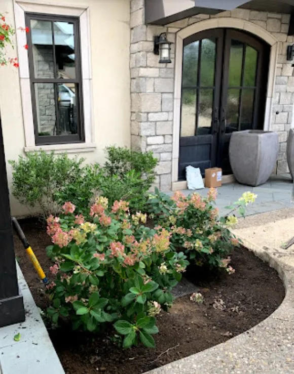 Professional lawn mowing service with custom design in Claypool, IN by Fouce Landscaping