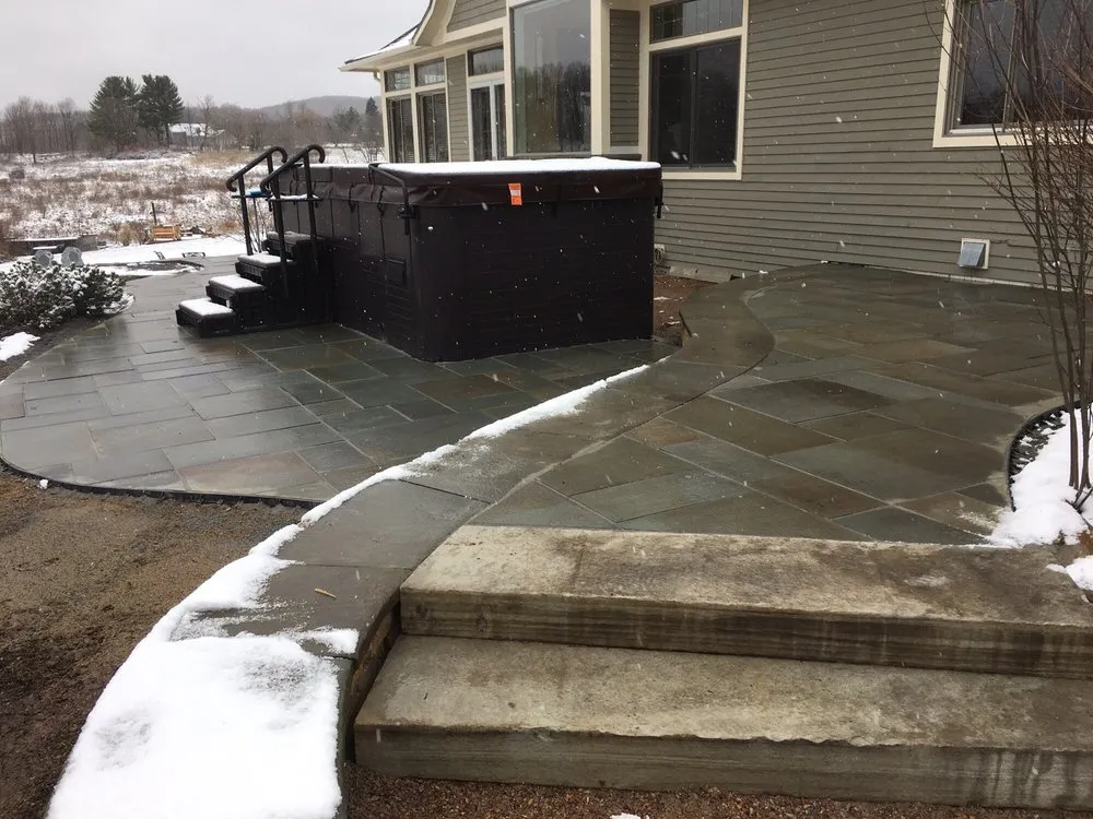 Reliable lawn mowing service for year-round maintenance in Saint Albans City, VT by Four Leaf Landscaping