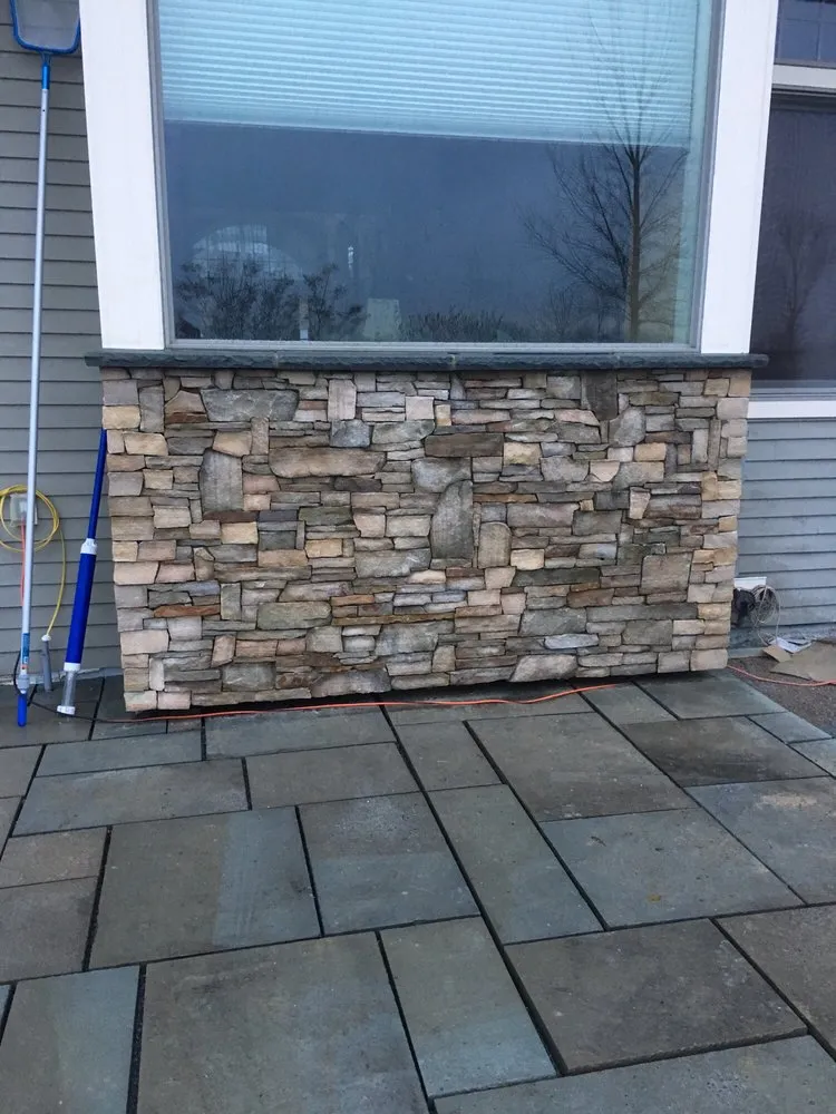 Local landscaping services for year-round maintenance across Saint Albans City, VT - Four Leaf Landscaping