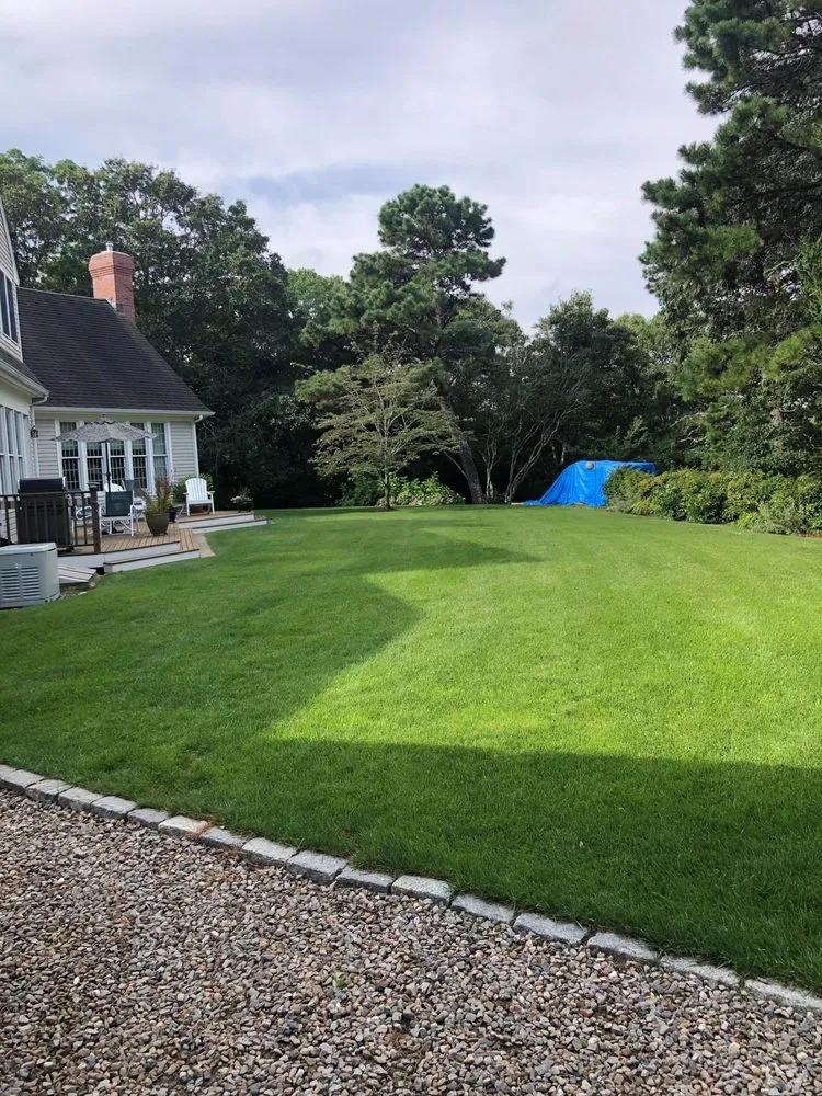 Professional outdoor landscaping experts serving Millbury, MA - Four Paws Lawn Care