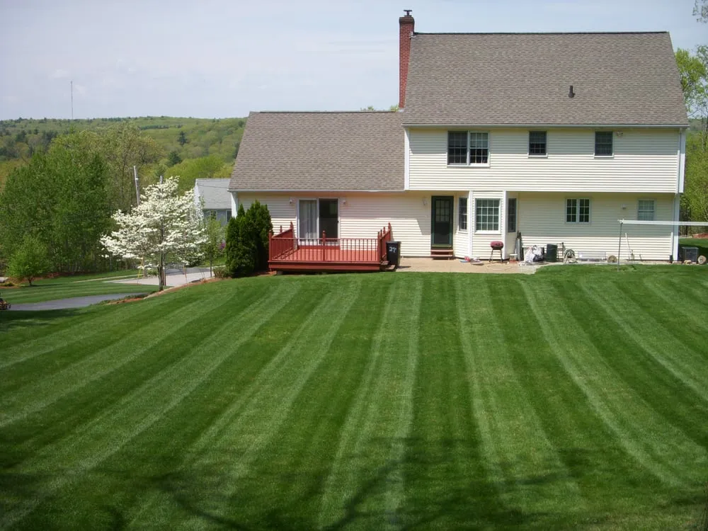 Local lawn mowing service for residential properties in Bellingham, MA by Four Seasons Landscape & Hardscape