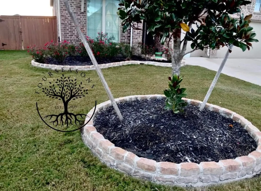 Affordable yard maintenance for homes in Magnolia, TX by Four Seasons Landscaping
