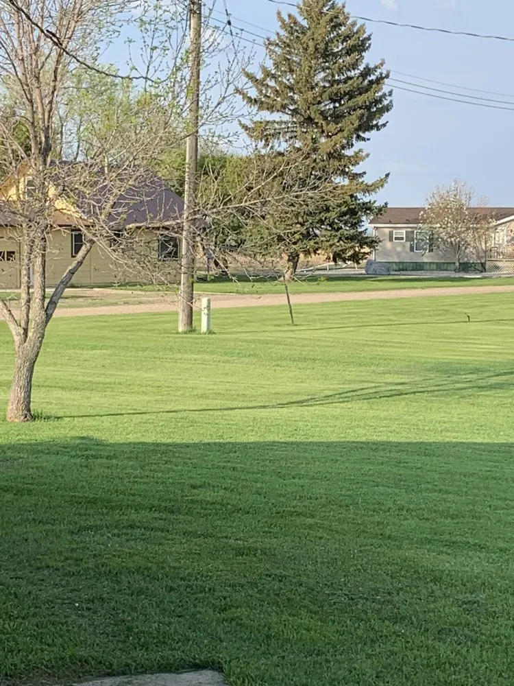 Expert outdoor landscaping for beautiful yards in Newburg, ND by Four Seasons Lawn Care