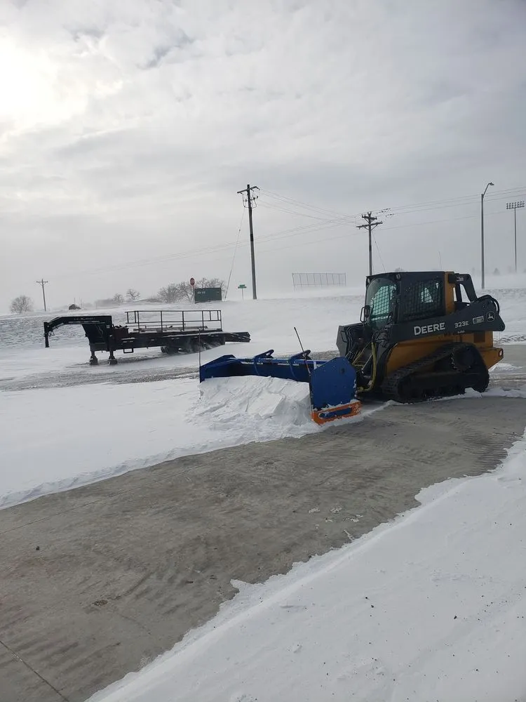 Professional outdoor landscaping with custom design across Pella, IA - Four Seasons Yard Care