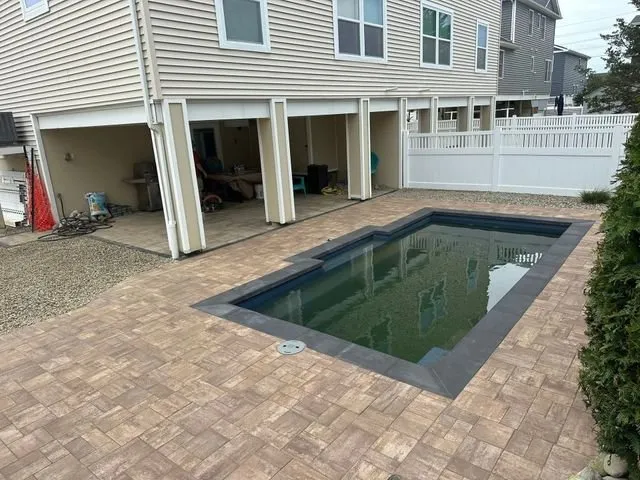 Professional yard maintenance with custom design in Stafford Township, NJ by Four Sons Hardscape & Landscape Designs