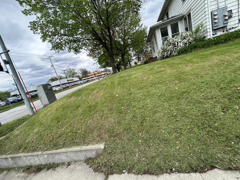 Professional residential landscaping with custom design in Des Moines, IA by Four Sons Lawncare