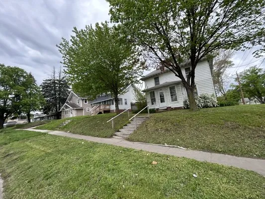 Four Sons Lawncare Logo