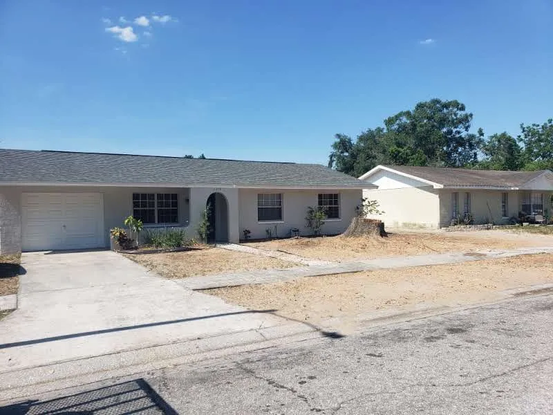 Trusted lawn care service for homes in Dover, FL by Fox's Cleanup