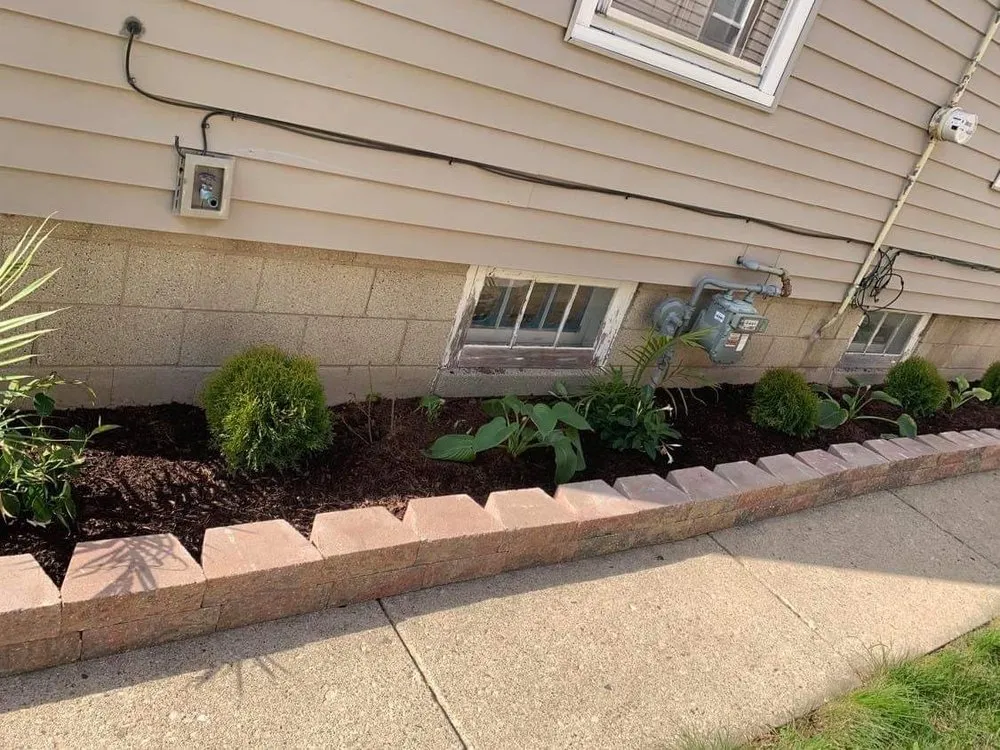 Professional lawn mowing service with custom design across Milwaukee, WI - Fraire Quinones Landscaping