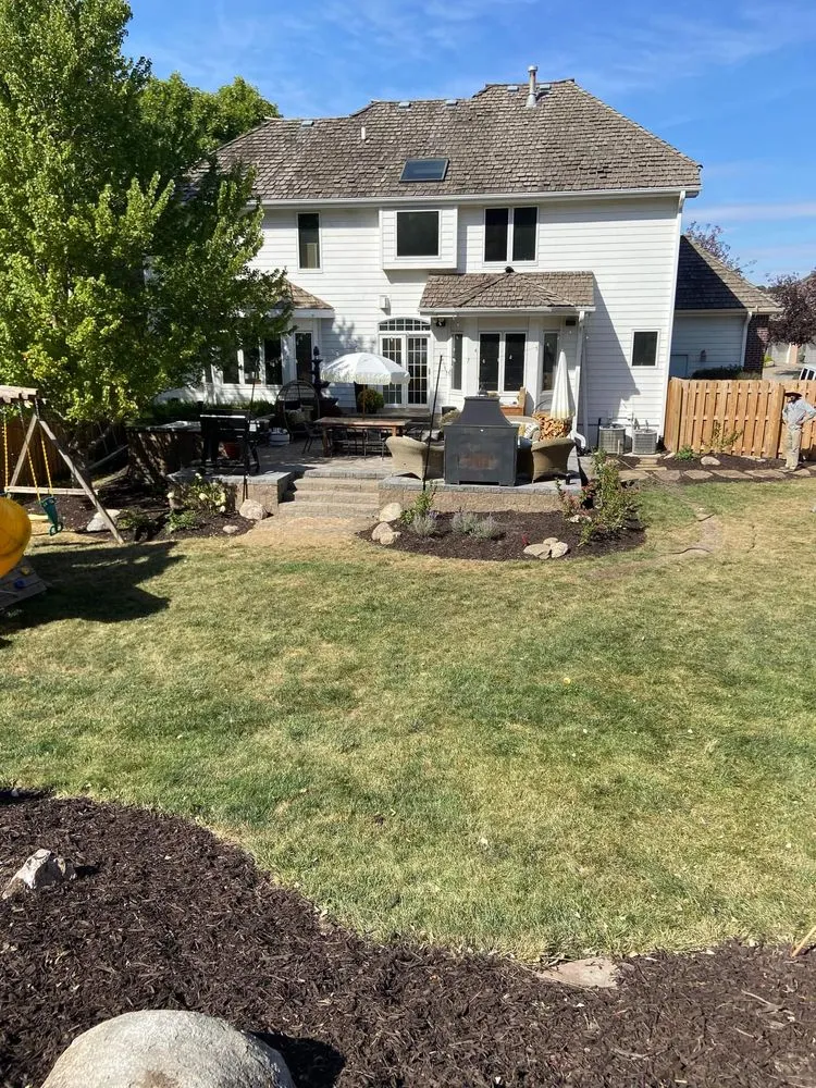 Custom landscape installation for year-round maintenance in Omaha, NE by Francia Hardscapes