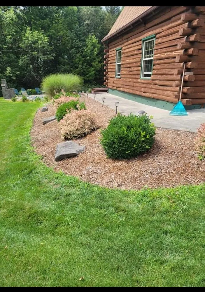 Custom lawn mowing service with custom design across Clifton Township, PA - Francis Construction