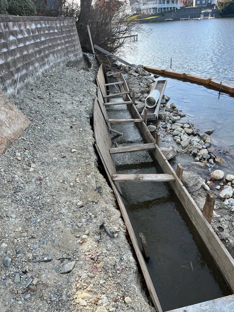 Trusted lawn mowing service for homes in Sutton, MA by Francisco Stonework